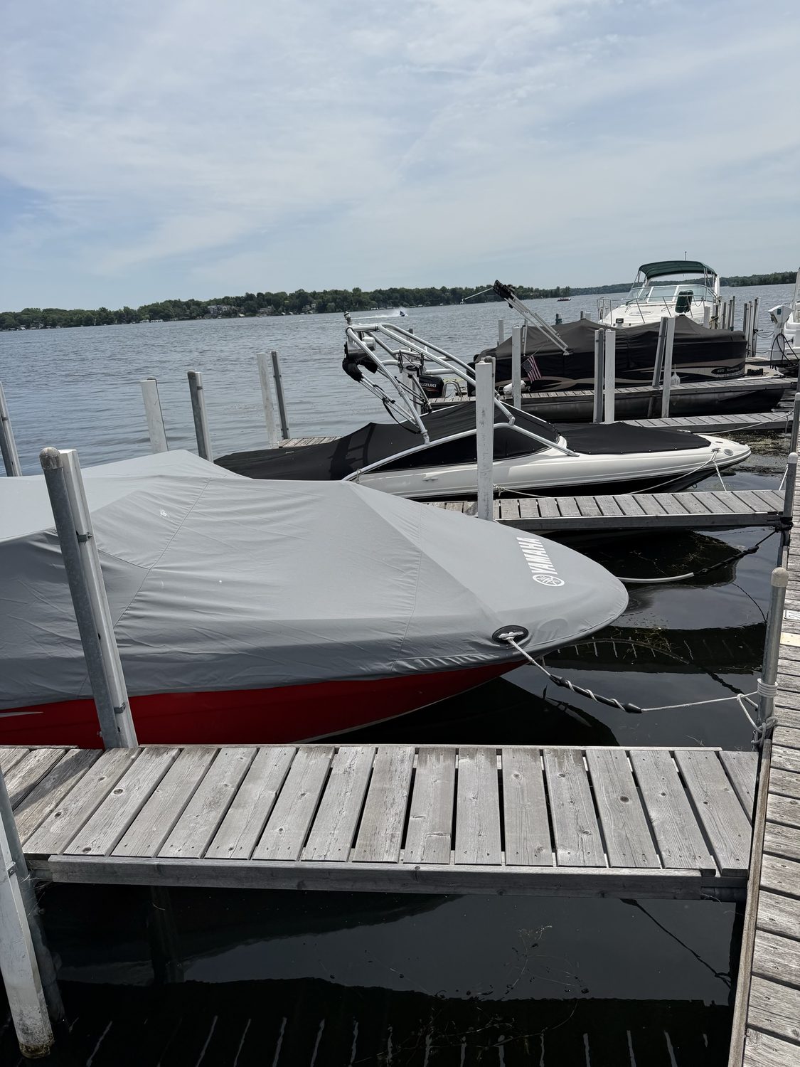 Boats docked at Chapman Place Marina slips on Lake Minnetonka